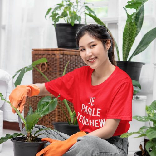 Je-parle-teochew-t-shirt-mockup-of-a-happy-woman-doing-some-gardening